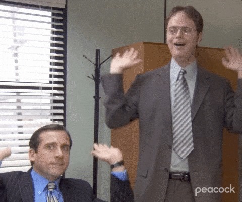 GIF of Michael Scott and Dwight Schrute celebrating